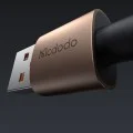 Кабел за данни – Mcdodo (CA-6891) – със светлина при зареждане, USB-C → USB-A, прозрачен кабел, 6A, 1.2m – Desert Gold