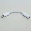 Аудио адаптер Lightning към 3,5 мм жак - Apple A1749 (MMX62ZM/A) - бял (блистерна опаковка)
